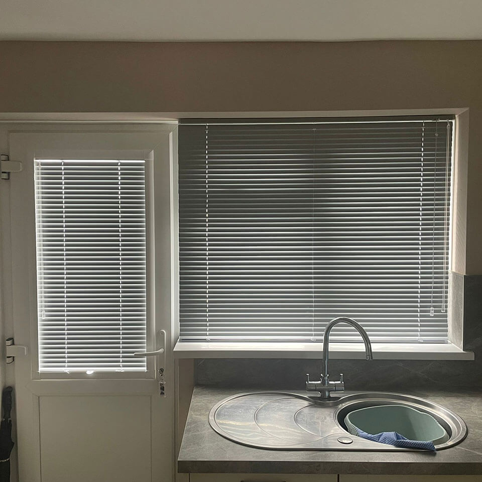 Perfect Fit Venetian blinds on French doors in Bournemouth kitchen